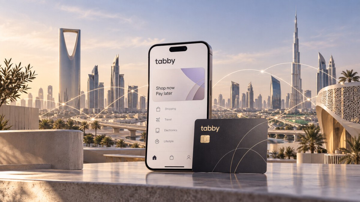 Conceptual illustration of a mobile payments platform and card against Riyadh and Dubai financial districts
